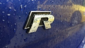 "R" badge