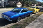 Blue Corvair and yellow Evo