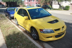 Blue Corvair and yellow Evo